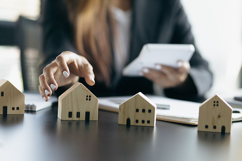 Jefferson County commercial real estate agent showing miniature houses